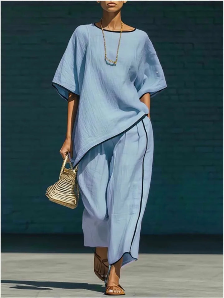 Women's chic 2-piece set: relaxed top & wide-leg cropped pants. Perfect for effortless style.