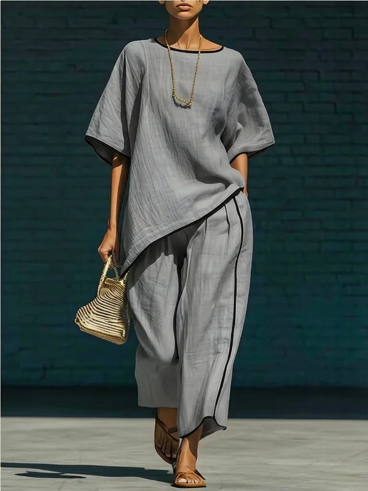 Matching women's 2-piece set with a relaxed top & versatile wide-leg cropped pants for daily wear.
