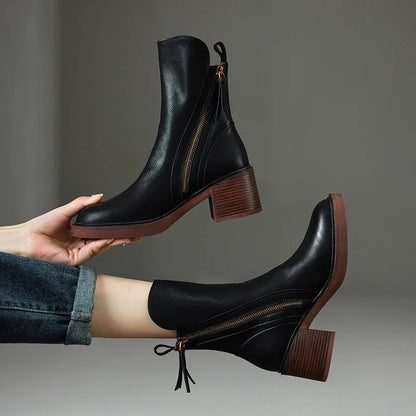 Women's chic ankle boots with comfortable block heel, perfect for versatile fall fashion.