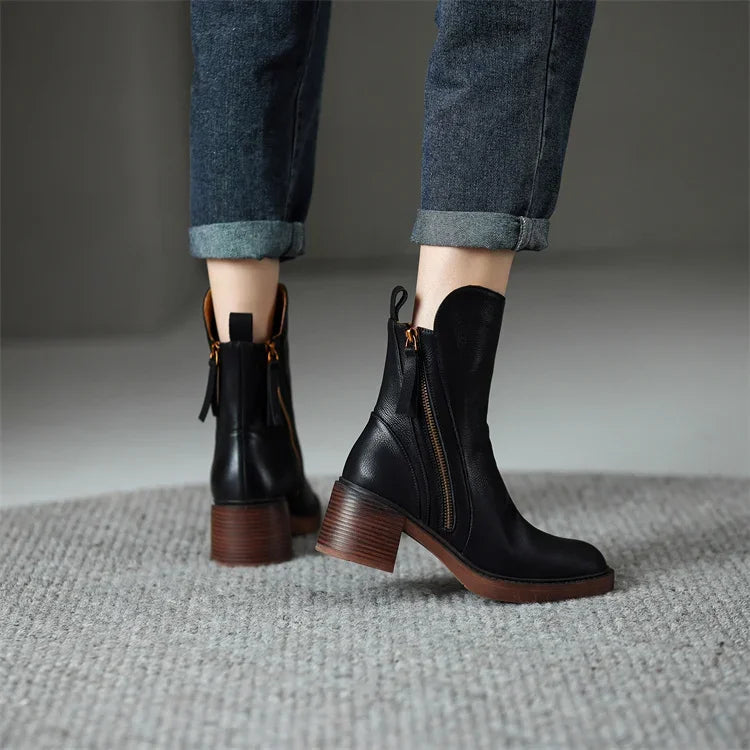 Stylish women's boots with block heel, tassel detail, and side zip closure for winter.