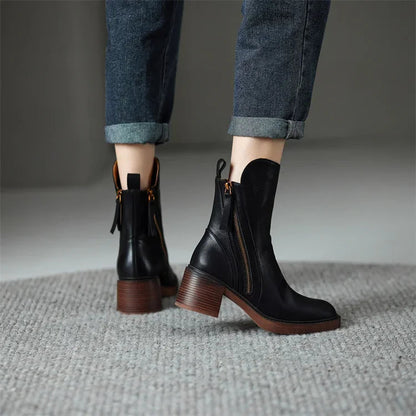 Stylish women's boots with block heel, tassel detail, and side zip closure for winter.