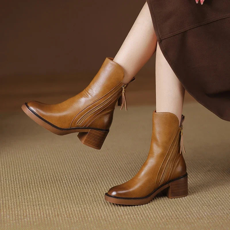 Chic women's block heel ankle boots for fall, offering comfort & versatile wear.