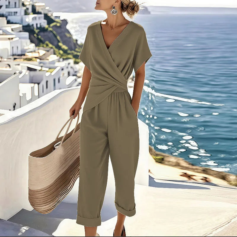 Effortlessly chic women's khaki wrap cropped jumpsuit. Versatile wide-leg design, ideal for stylish warm weather.