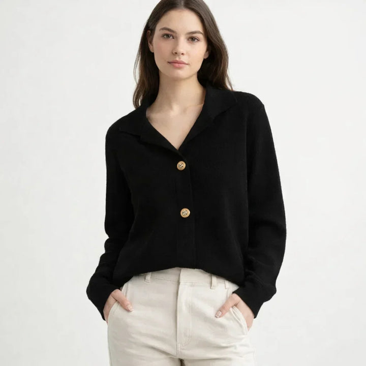 Stylish women's asymmetrical knit cardigan with prominent button details, great for chic fall outerwear.