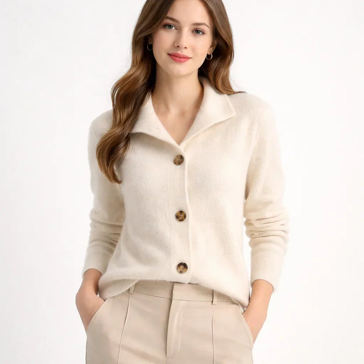 Fashionable asymmetrical women's knit cardigan with decorative buttons, a must-have for modern fall style.
