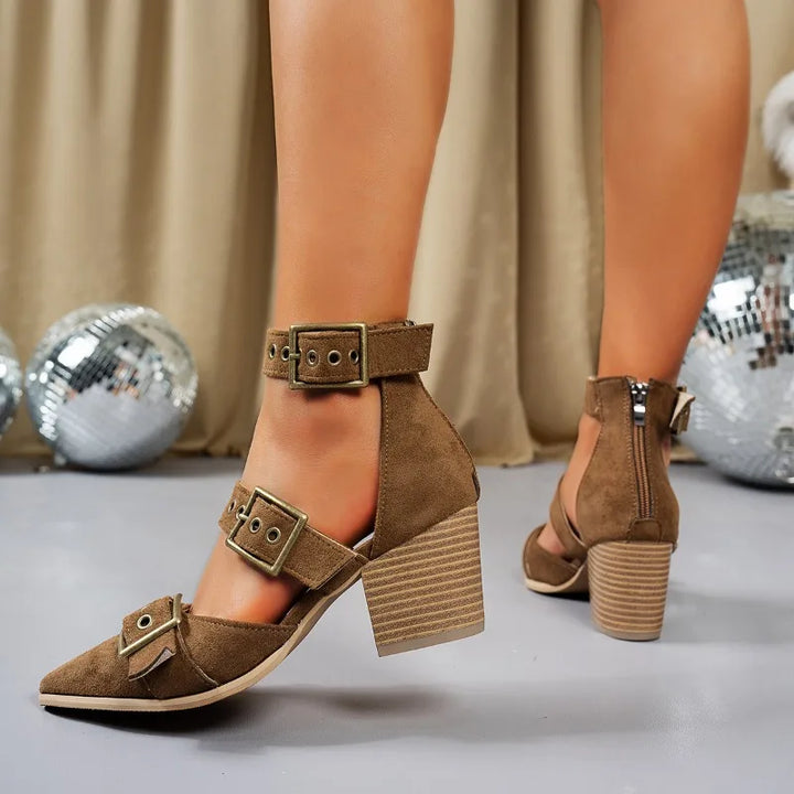 Comfortable women's dress shoes: black block heels with chic triple buckle detail.
