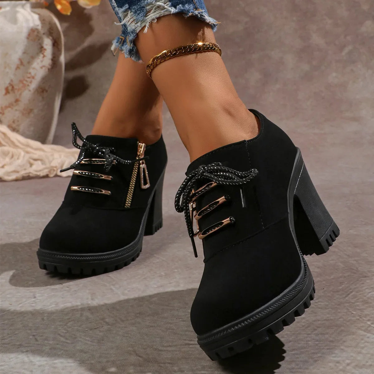 Chic black women's block heel boots with orthopedic support, suitable for dress or everyday wear.