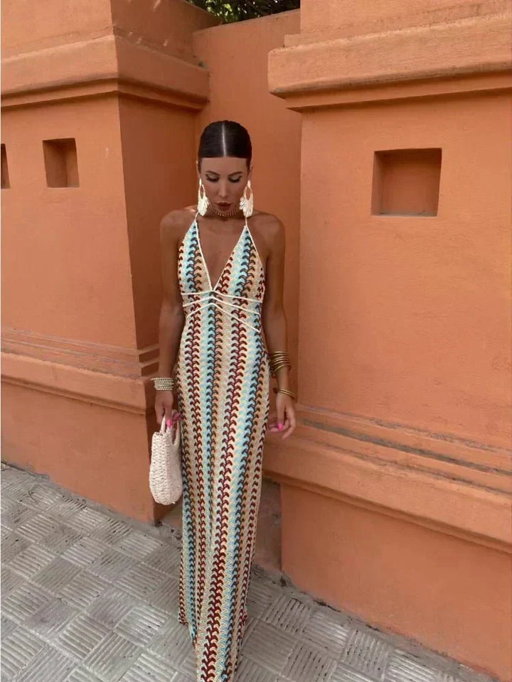 Women's chic boho printed maxi wedding guest dress. Elegant halter design perfect for summer events.
