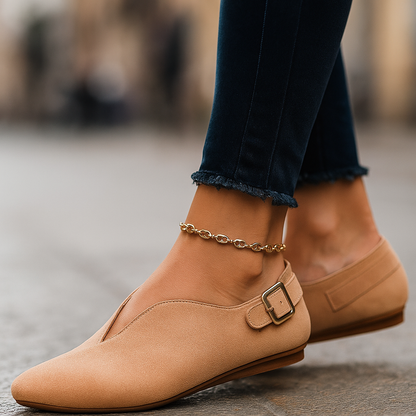 Chic women's flats featuring a sophisticated buckle. Experience all-day comfort with these stylish slip-on loafers.