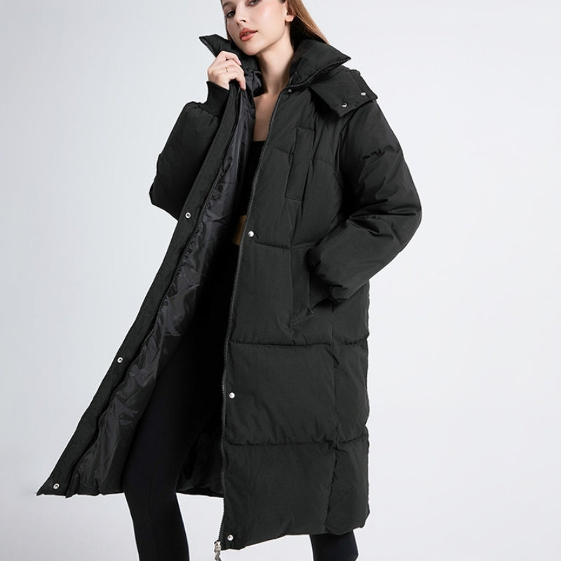 Women's Chic Cortina long puffer jacket for ultimate winter warmth & style. Cozy cold weather outerwear.