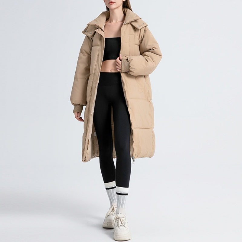 Elegant women's Cortina long puffer jacket. Ideal stylish outerwear for winter's chill & daily adventures.