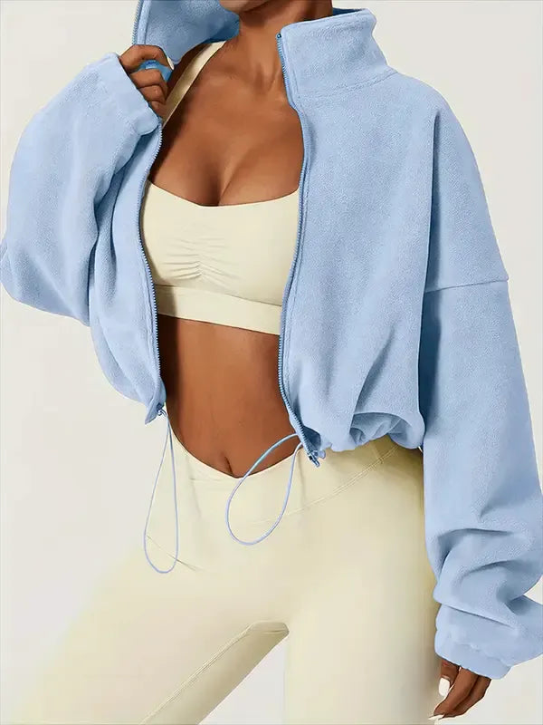 Women's chic cropped zip jacket with a high collar, perfect for modern casual outerwear. Versatile and stylish.