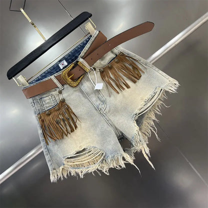 Trendy women's khaki denim shorts featuring a fashionable fringe detail, perfect for casual wear.