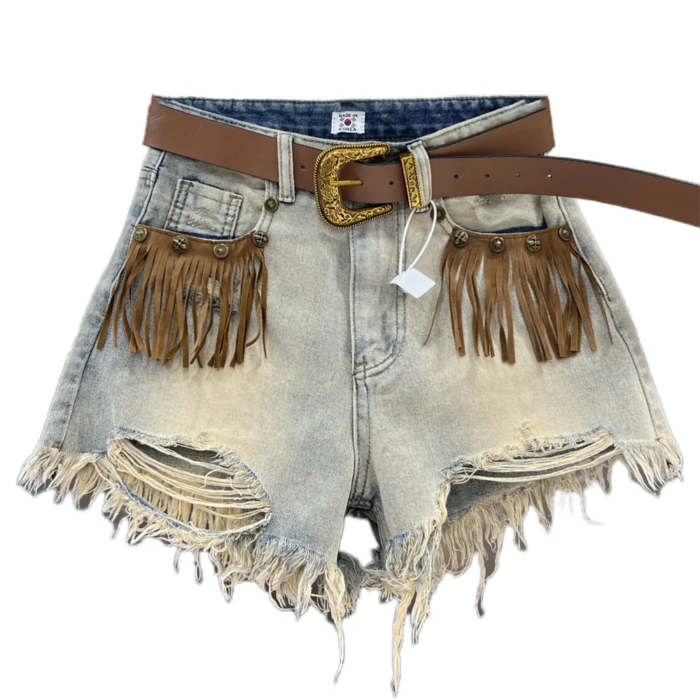 Fashion-forward women's fringe denim shorts, a comfortable and stylish bottom for any occasion.