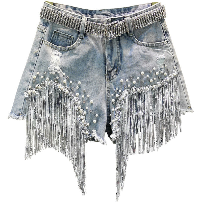 Women's chic denim shorts with tassels, perfect for summer fashion & warm weather style.
