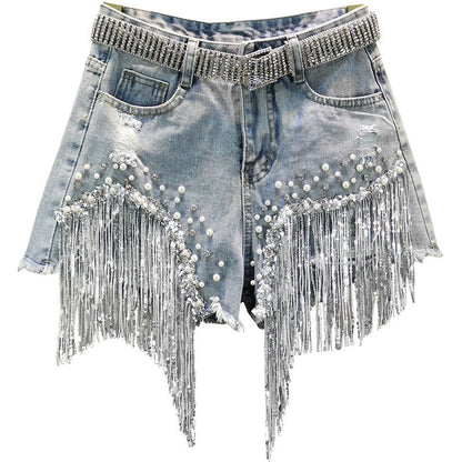 Women's chic denim shorts with tassels, perfect for summer fashion & warm weather style.