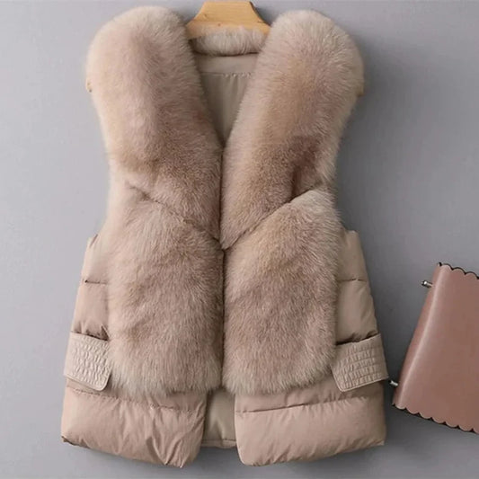 Women's chic faux fur quilted vest, perfect for warm winter layering or elegant outerwear. Sleeveless jacket style.