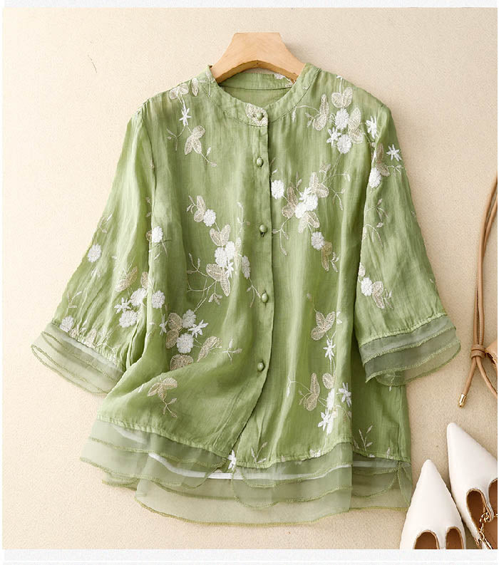 Women's Chic Floral Blouse with elegant button patchwork design.