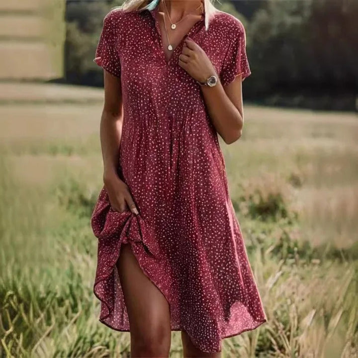 Women's printed floral dress, a stylish midi sundress for summer. Versatile for casual wear or parties.