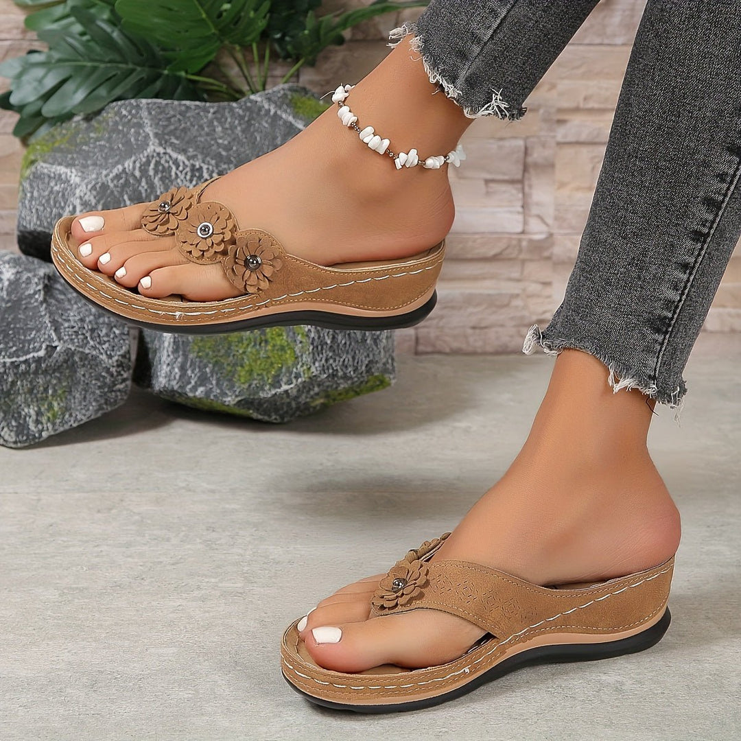 Comfortable women's floral platform wedge sandals, perfect for chic everyday wear.