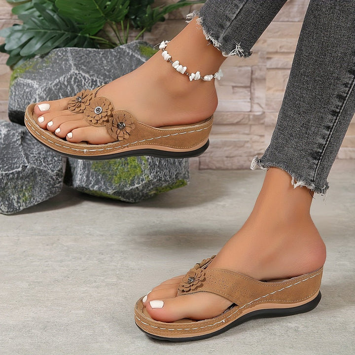 Comfortable women's floral platform wedge sandals, perfect for chic everyday wear.