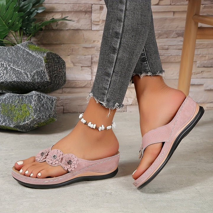 Casual slip-on women's floral platform wedge sandals, ideal for warm weather.