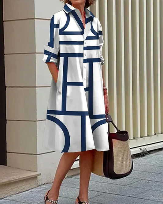 Women's chic geometric print dress with practical pockets, perfect for versatile spring, summer, or office fashion.
