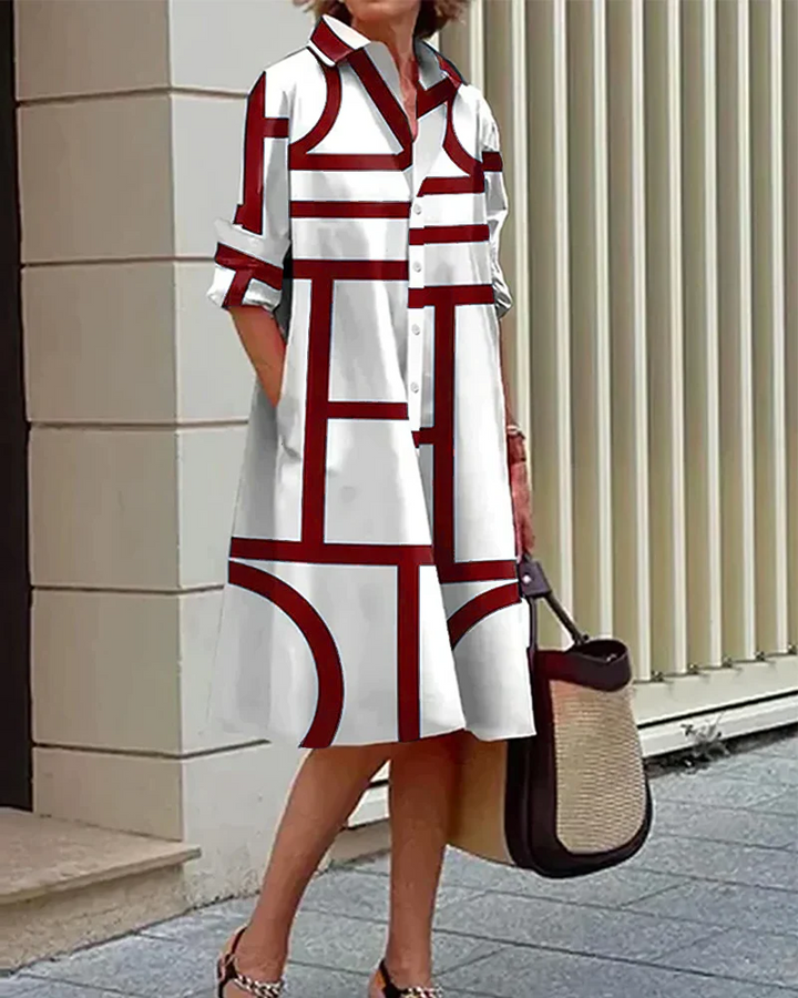 Elegant women's geometric print day dress with convenient pockets, ideal for casual spring style or chic office wear.