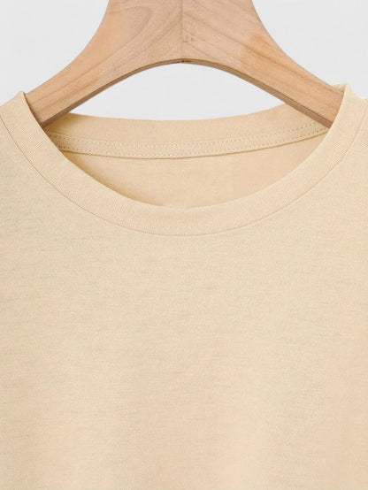 Elegant heart print short sleeve t-shirt for women, a stylish round neck graphic tee.