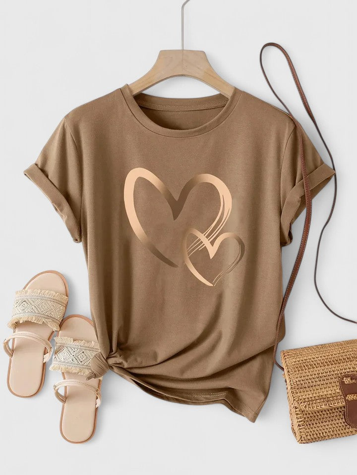 Women's heart print graphic tee, a chic short sleeve t-shirt for summer and everyday comfort.