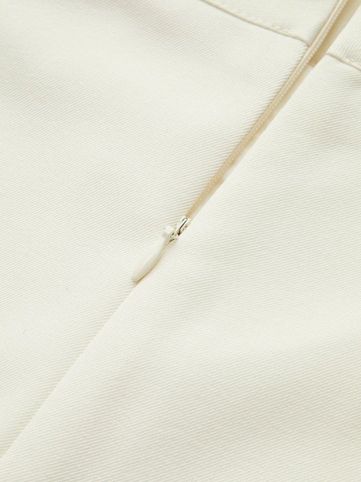 Sophisticated women's belted A-line mini skirt. High-waisted for a flattering fit & chic style.