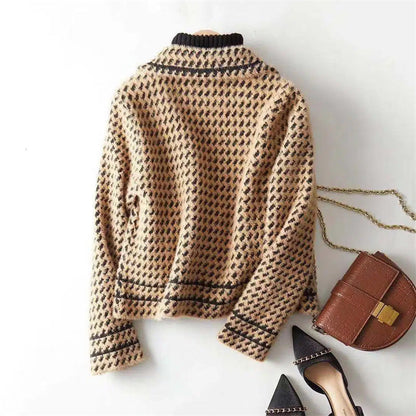 Classic houndstooth pattern on a tailored women's knit jacket, chic & elegant.