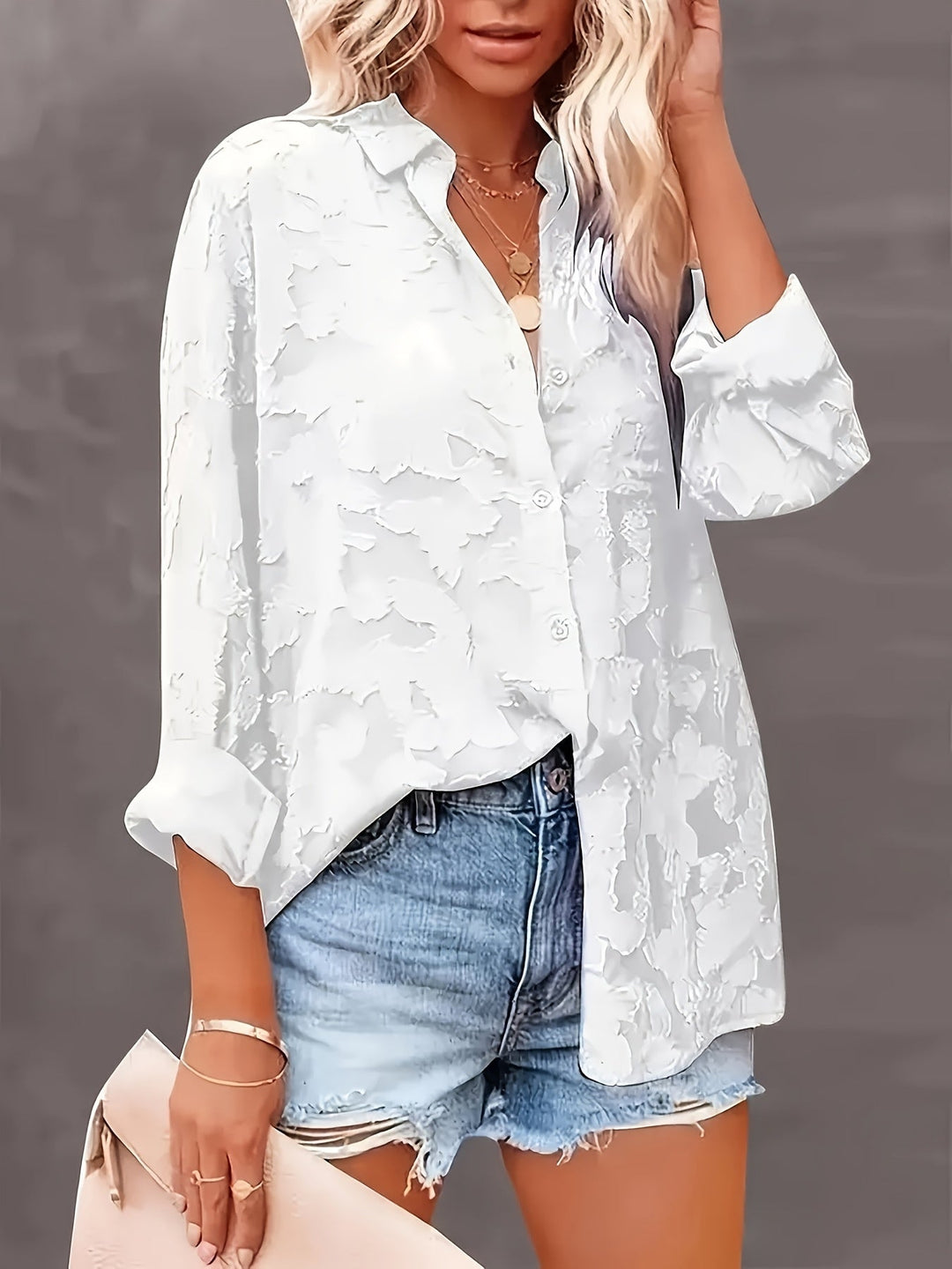 Elegant women's textured jacquard V-neck long sleeve top, versatile for casual chic and professional looks.