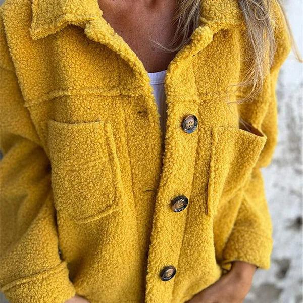 Warm & chic women's autumn jacket, lapel collar, stylish outerwear for fall season.