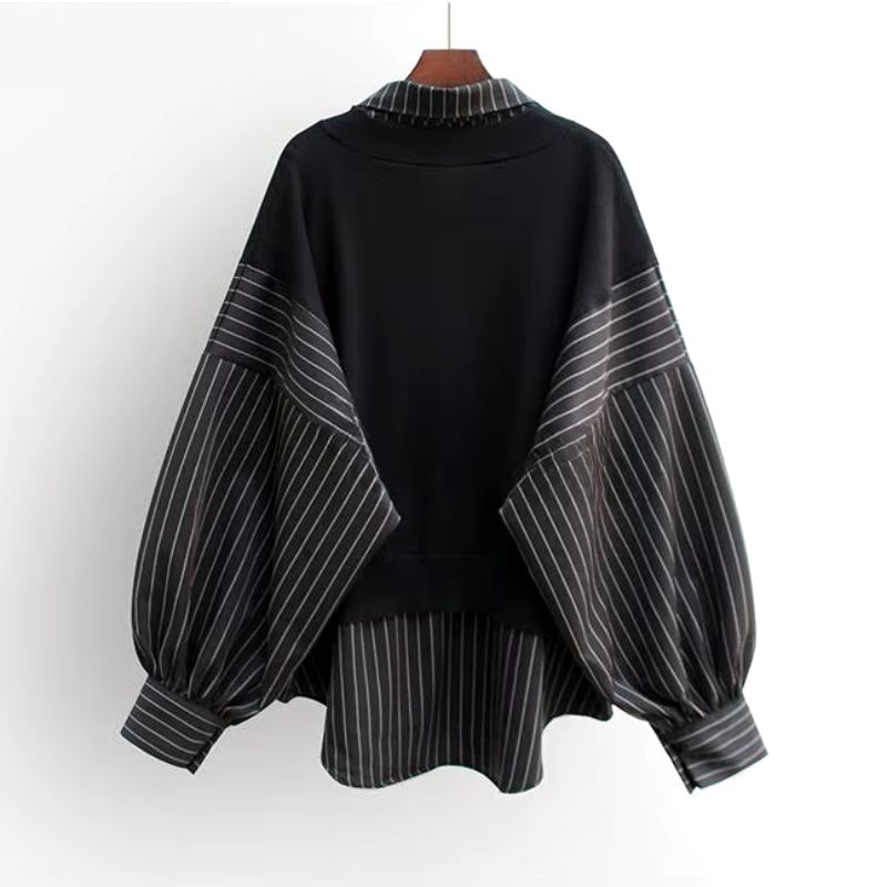 Comfortable & stylish women's layered blouse. Chic top for versatile office or casual wear.