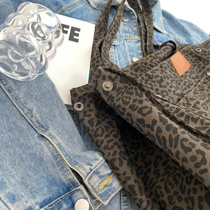 Close-up of a women's leopard print shoulder bag, showcasing its chic animal print & quality design.