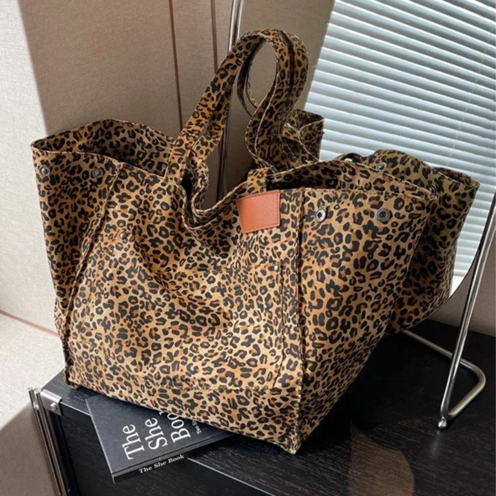 Spacious women's leopard print tote bag, a fashionable animal print accessory for daily essentials.