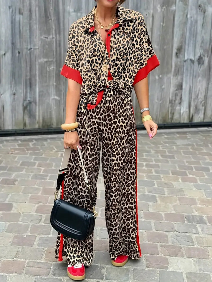 Women's chic leopard print wide leg V-neck jumpsuit. Stylish, comfortable one-piece for casual fashion or vacation.