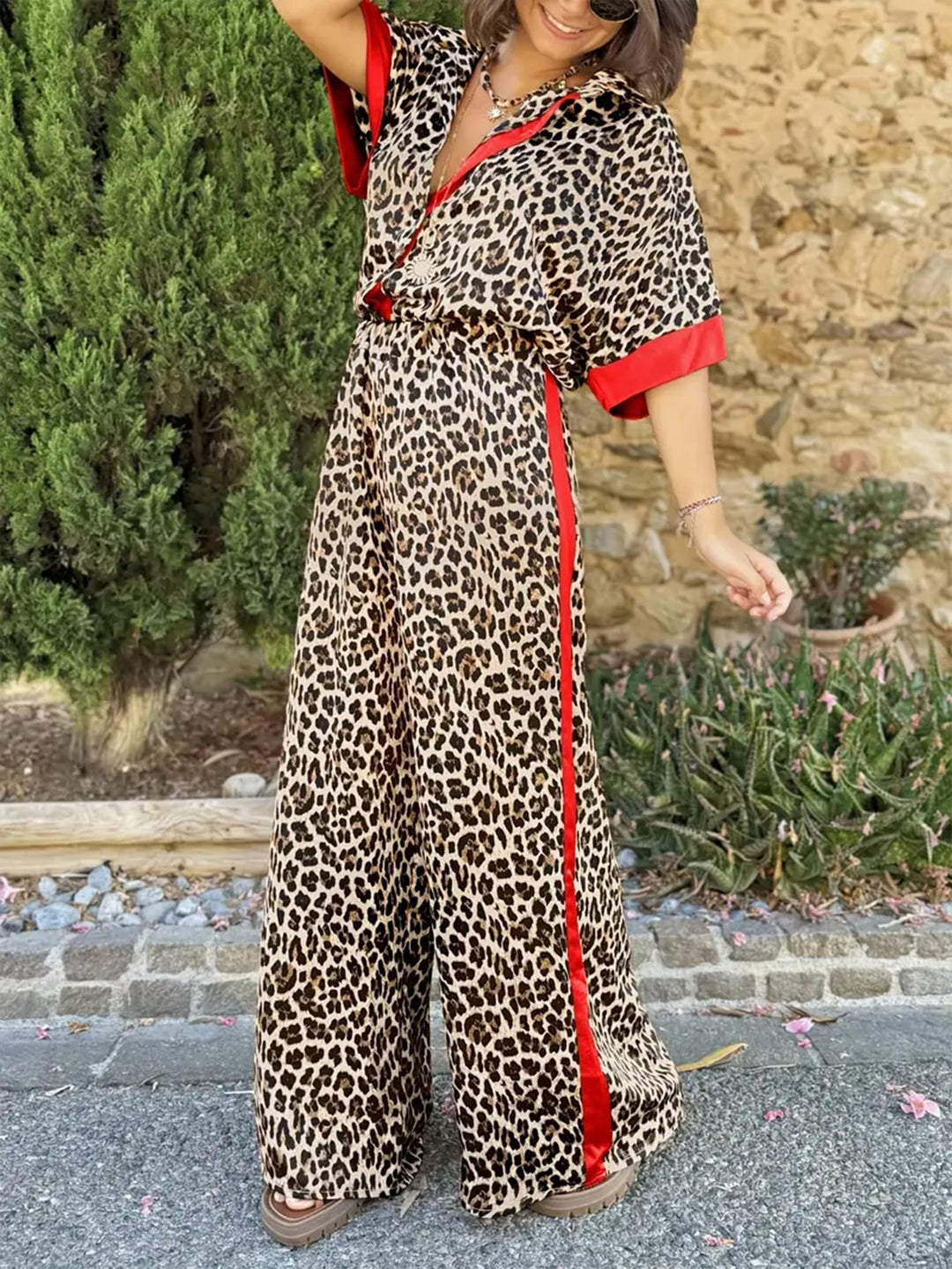 Leopard print wide leg V-neck jumpsuit for women. Perfect summer vacation wear, relaxed fit & comfortable.