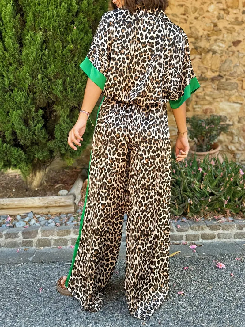 Versatile women's leopard print wide leg V-neck jumpsuit. Great for casual wear, summer, or stylish vacation outfits.