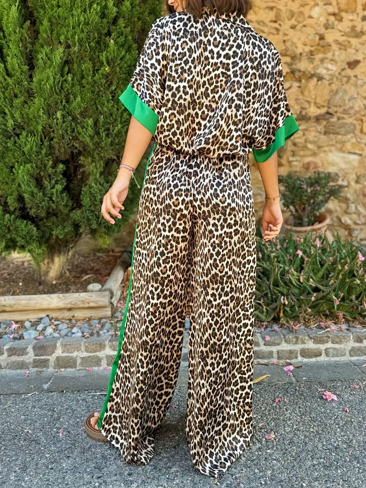 Versatile women's leopard print wide leg V-neck jumpsuit. Great for casual wear, summer, or stylish vacation outfits.