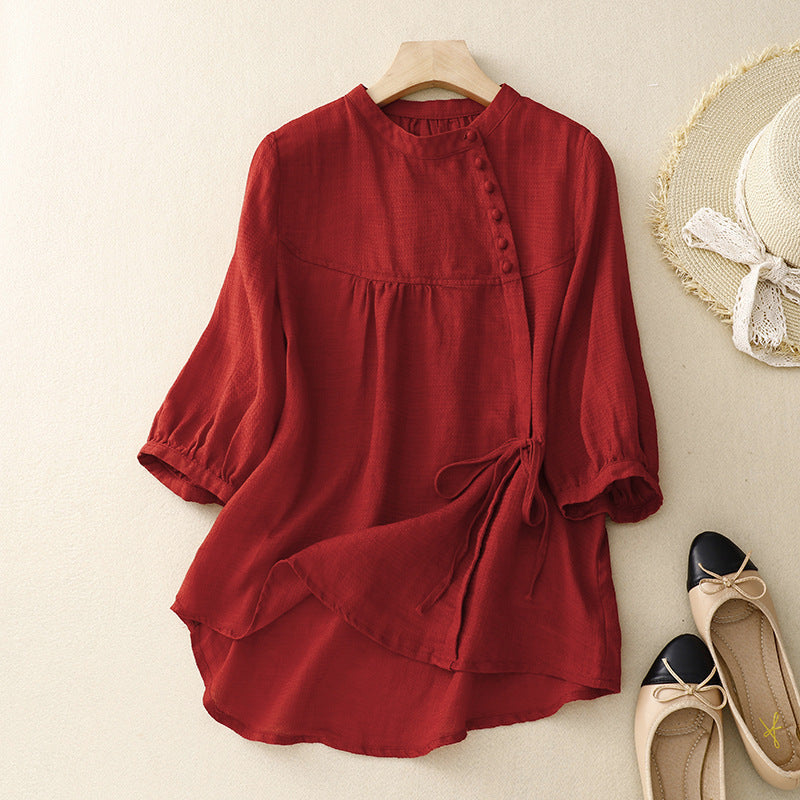 Flattering red wrap top for women, featuring stylish puff sleeves; a versatile piece for casual or elegant wear.