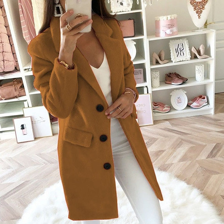 Versatile women's long blazer, perfect layering piece for fall fashion & elegant winter style.