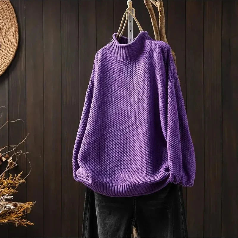 Women's chic loose fit pullover sweater. Comfortable and casual, perfect for everyday relaxed style.