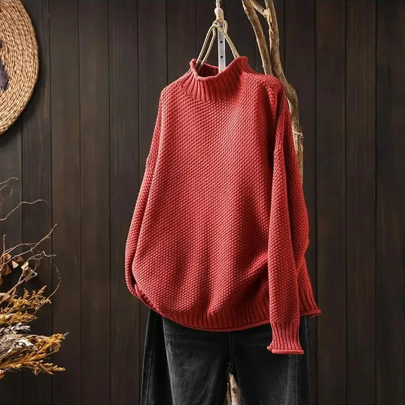 Comfortable women's relaxed fit long sleeve sweater. Effortless style for casual wear and everyday comfort.
