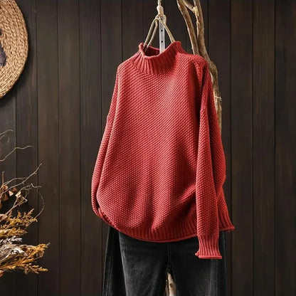 Comfortable women's relaxed fit long sleeve sweater. Effortless style for casual wear and everyday comfort.