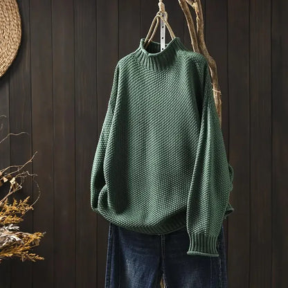 Women's cozy loose fit long sleeve sweater. Comfortable and chic pullover for relaxed everyday style.