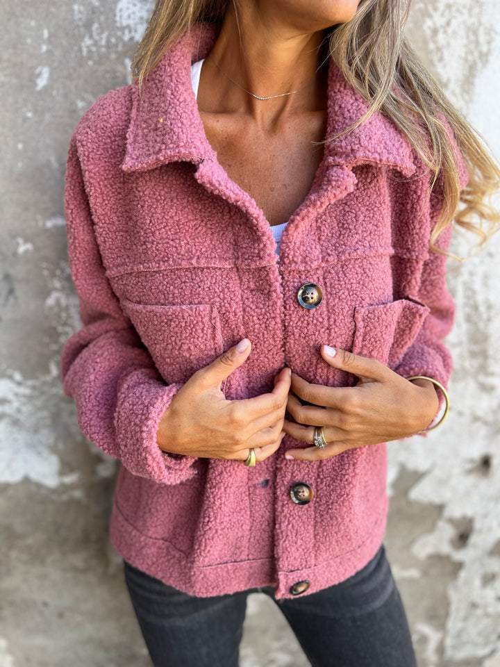Stylish women's button-up autumn coat, featuring a classic notch collar. Great for fall & winter.
