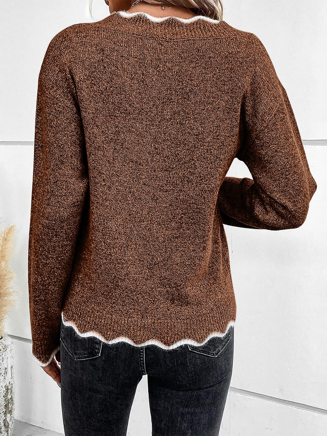 Soft fabric detail of a ladies' notch V-neck sweatshirt, offering ultimate comfort and chic style.