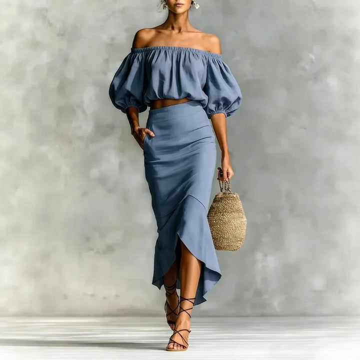 Women's summer off-shoulder two-piece set featuring a puff sleeve crop top and stylish wrap midi skirt.